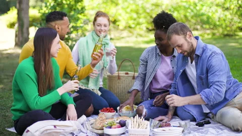 Mid-shot front view of cheerful group of coworkers going over details of new Stock Footage 278021146