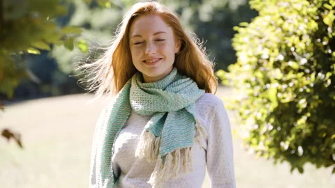Mid-shot front view of cheerful group of coworkers going over details of new Stock Footage 278021368