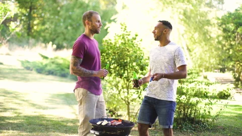 Mid-shot front view of cheerful group of coworkers going over details of new Stock Footage 278022410