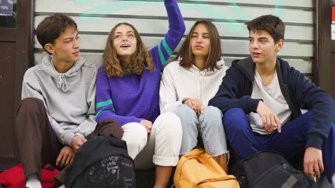 Mid-shot front view of diverse group of coworkers exchanging ideas and Video stock 278015643