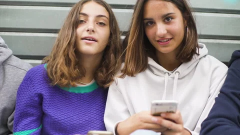 Mid-shot front view of diverse group of coworkers exchanging ideas and Stock Footage 278015662