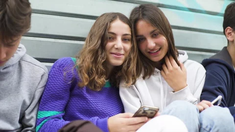 Mid-shot front view of diverse group of coworkers exchanging ideas and Stock Footage 278015778