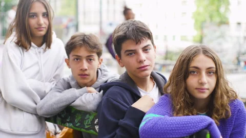 Mid-shot front view of diverse group of coworkers exchanging ideas and Stock Footage 278015801