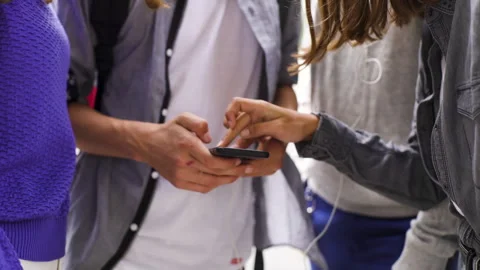 Mid-shot front view of diverse group of colleagues sharing ideas while working Stock Footage 278016178