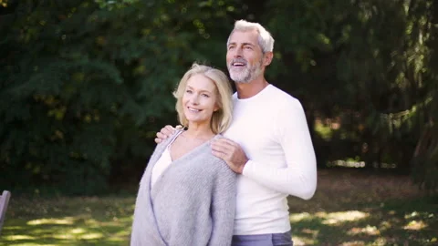 Mid-shot front view of diverse group of colleagues sharing ideas while working Stock Footage 278016359