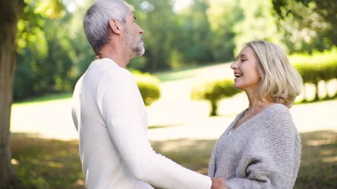 Mid-shot front view of diverse group of colleagues sharing ideas while working Stock Footage 278016443
