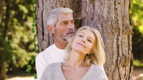 Mid-shot front view of diverse group of colleagues sharing ideas while working Stock Footage 278016551