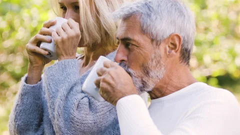 Mid-shot front view of diverse group of colleagues sharing ideas while working Stock Footage 278017001