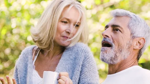 Mid-shot front view of diverse group of colleagues sharing ideas while working Stock Footage 278017133