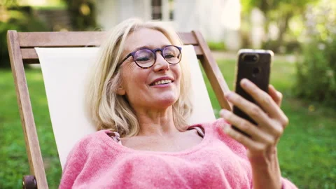 Mid-shot front view of diverse group of colleagues sharing ideas while working Stock Footage 278017406