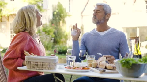 Mid-shot front view of diverse group of colleagues sharing ideas while working Stock Footage 278017657