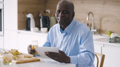 Mid-shot front view of diverse group of coworkers chatting and looking at Stock Footage 278039627