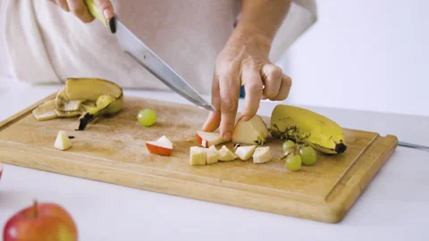Mid-shot front view of diverse group of coworkers chatting and looking at Stock Footage 278039762