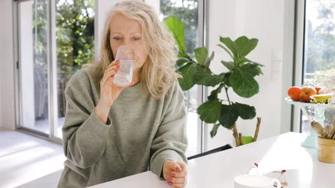 Mid-shot front view of diverse group of coworkers chatting and looking at Stock Footage 278044097