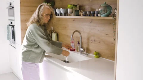 Mid-shot front view of diverse group of coworkers chatting and looking at Stock Footage 278044393