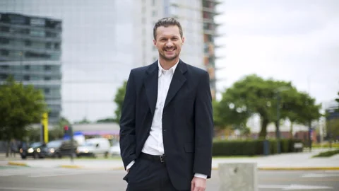 Mid-shot front view of handsome professional man looking confidently at camera Stock Footage 277975279