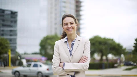 Mid-shot front view of young female entrepreneur standing with arms crossed Stock Footage 277975239