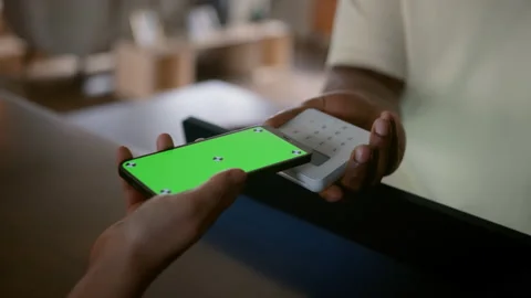 Mid Shot Green Screen Smart Phone with Customer Paying on Digital Payment Stock Footage 233818269