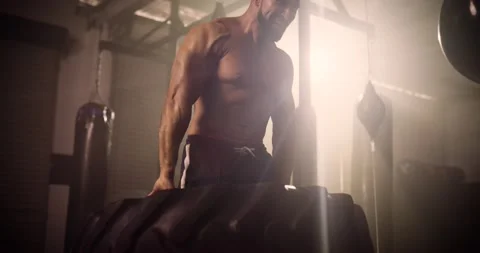 A Mid Shot Of A Hispanic Bodybuilder Tyre Walking In A Crossfit Gym Stock Footage 158453049