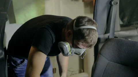 Mid shot man cleaners old and dry car Stock Footage 65761621
