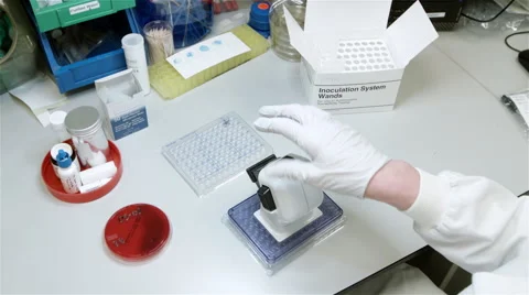 Mid shot of microbiologist desk in lab for testing. Stock Footage 49081395