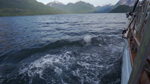 Mid shot of the side of sailboat flowing thru the water Video stock 146188981