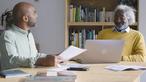 Mid-shot side view of diverse group of coworkers chatting in company hallway Stock Footage 278034864