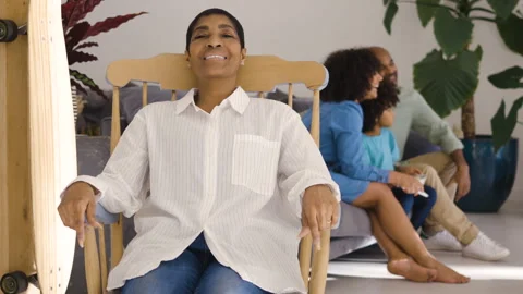 Mid-shot side view of diverse group of coworkers chatting in company hallway Stock Footage 278034944