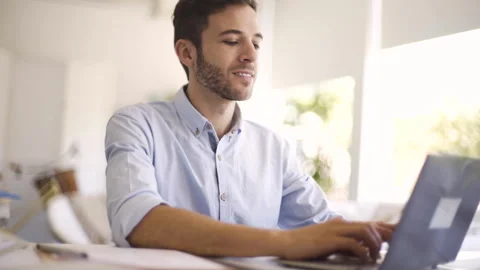 Mid-shot side view of unrecognizable woman's hands touching laptop's touchpad Stock Footage 277982423