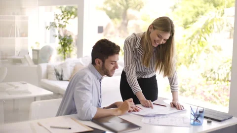 Mid-shot side view of unrecognizable woman's hands touching laptop's touchpad Stock Footage 277982759
