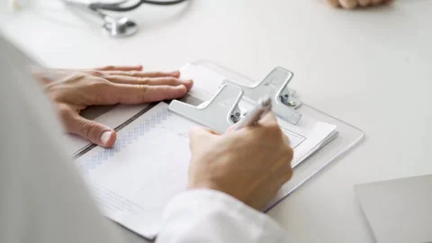 Mid-shot side view of unrecognizable woman's hands touching laptop's touchpad Stock Footage 277983678