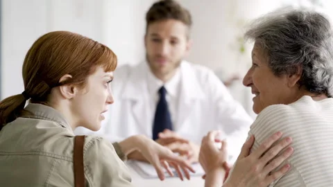 Mid-shot side view of unrecognizable woman's hands touching laptop's touchpad Stock Footage 277984186