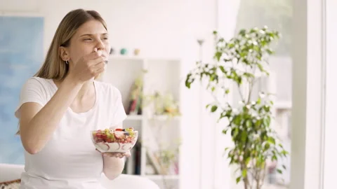 Mid-shot side view of unrecognizable woman's hands touching laptop's touchpad Stock Footage 277984229