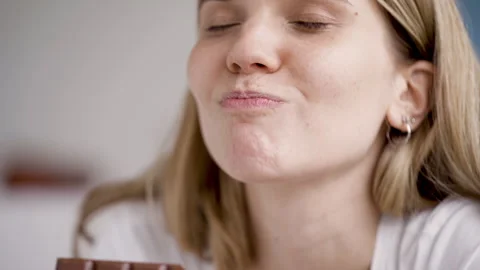Mid-shot side view of unrecognizable woman's hands touching laptop's touchpad Stock Footage 277984734