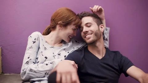 Mid-shot side view of unrecognizable person's hands touching and tapping on Stock Footage 277986140