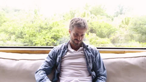 Mid-shot side view of unrecognizable person's hands touching and tapping on Stock Footage 277988551