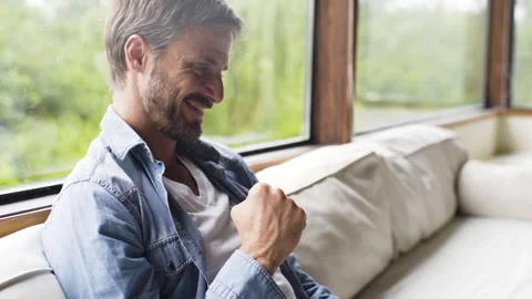 Mid-shot side view of unrecognizable person's hands touching and tapping on Stock Footage 277988883