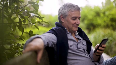 Mid-shot side view of unrecognizable person's hands touching and tapping on Stock Footage 277992996