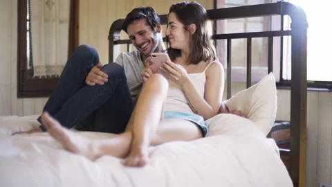 Mid-shot side view of unrecognizable person's hands touching and tapping on Stock Footage 277996329