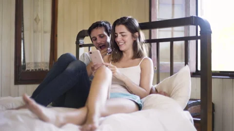 Mid-shot side view of unrecognizable person's hands touching and tapping on Stock Footage 277996615