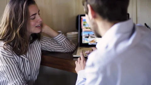 Mid-shot side view of unrecognizable person's hands touching and tapping on Stock Footage 277996799