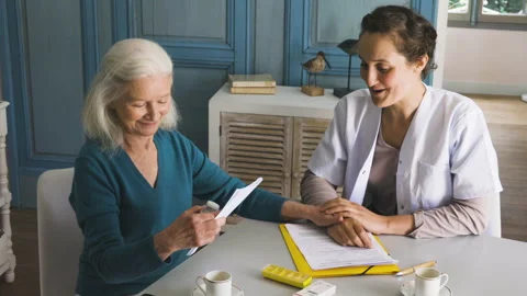Mid-shot side view of unrecognizable person's hands holding cell phone and Stock Footage 278012920