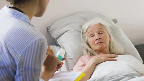 Mid-shot side view of unrecognizable person's hands holding cell phone and Stock Footage 278013349