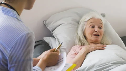Mid-shot side view of unrecognizable person's hands holding cell phone and Stock Footage 278013426
