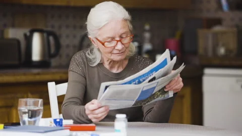 Mid-shot side view of unrecognizable person's hands holding cell phone and Stock Footage 278014192