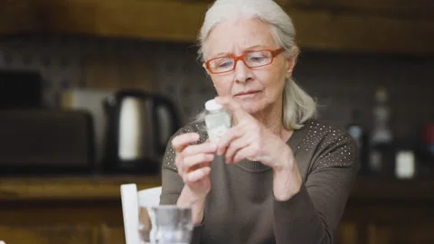 Mid-shot side view of unrecognizable person's hands holding cell phone and Stock Footage 278014206