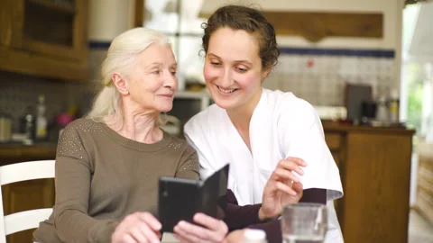 Mid-shot side view of unrecognizable person's hands holding cell phone and Stock Footage 278014340