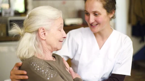 Mid-shot side view of unrecognizable person's hands holding cell phone and Stock Footage 278014351