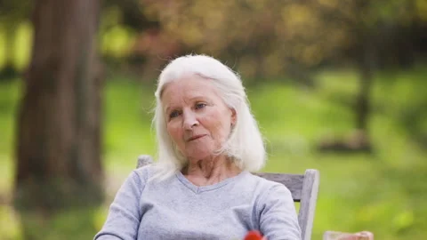 Mid-shot side view of unrecognizable person's hands holding cell phone and Stock Footage 278014606