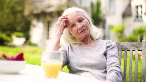 Mid-shot side view of unrecognizable person's hands holding cell phone and Stock Footage 278014719